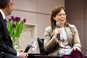 Carla MacLeod, head coach of pro hockeyPWHL Ottawa, in conversation with Ottawa Mayor Mark Sutcliffe at an International Women's Day Breakfast held at Ottawa City Hall on Friday, March 8, 2024. Photo by Caroline Phillips