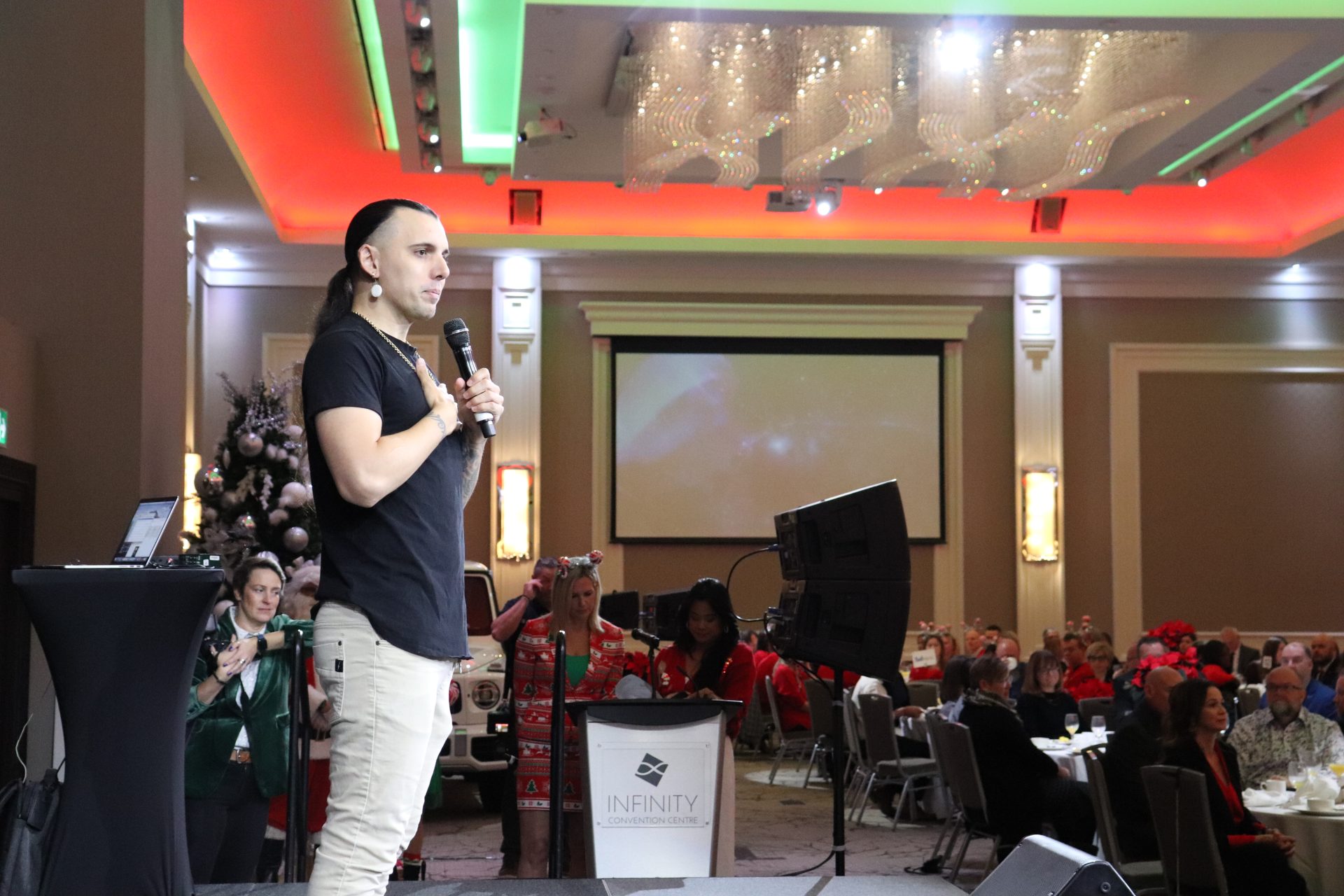 Ottawa hip hop artist Cody Coyote performs at the Christmas Cheer Breakfast. (Photo by Mia Jensen)