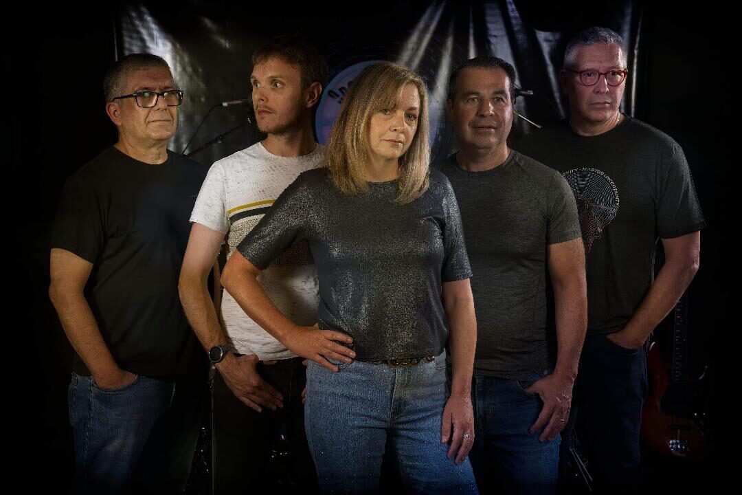 John Sicard (right) with his band, Open Channel D. (Supplied)