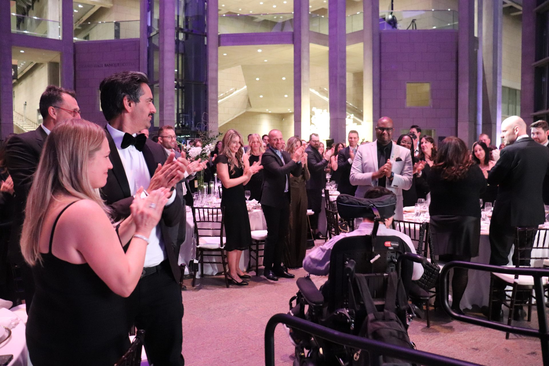 A standing ovation for featured speaker Kellen Schleyer. (Photo by Mia Jensen)