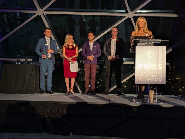 Jacqueline Belsito, president of the Ottawa Senators Community Foundation, accepts the outstanding fundraising professional award. Photo by Nickie Shobeiry.