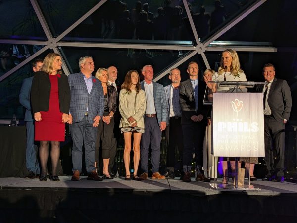 Michelle Taggart accepts the outstanding individual philanthropist award on behalf of the Taggart Parkes family. Photo by Nickie Shobeiry.